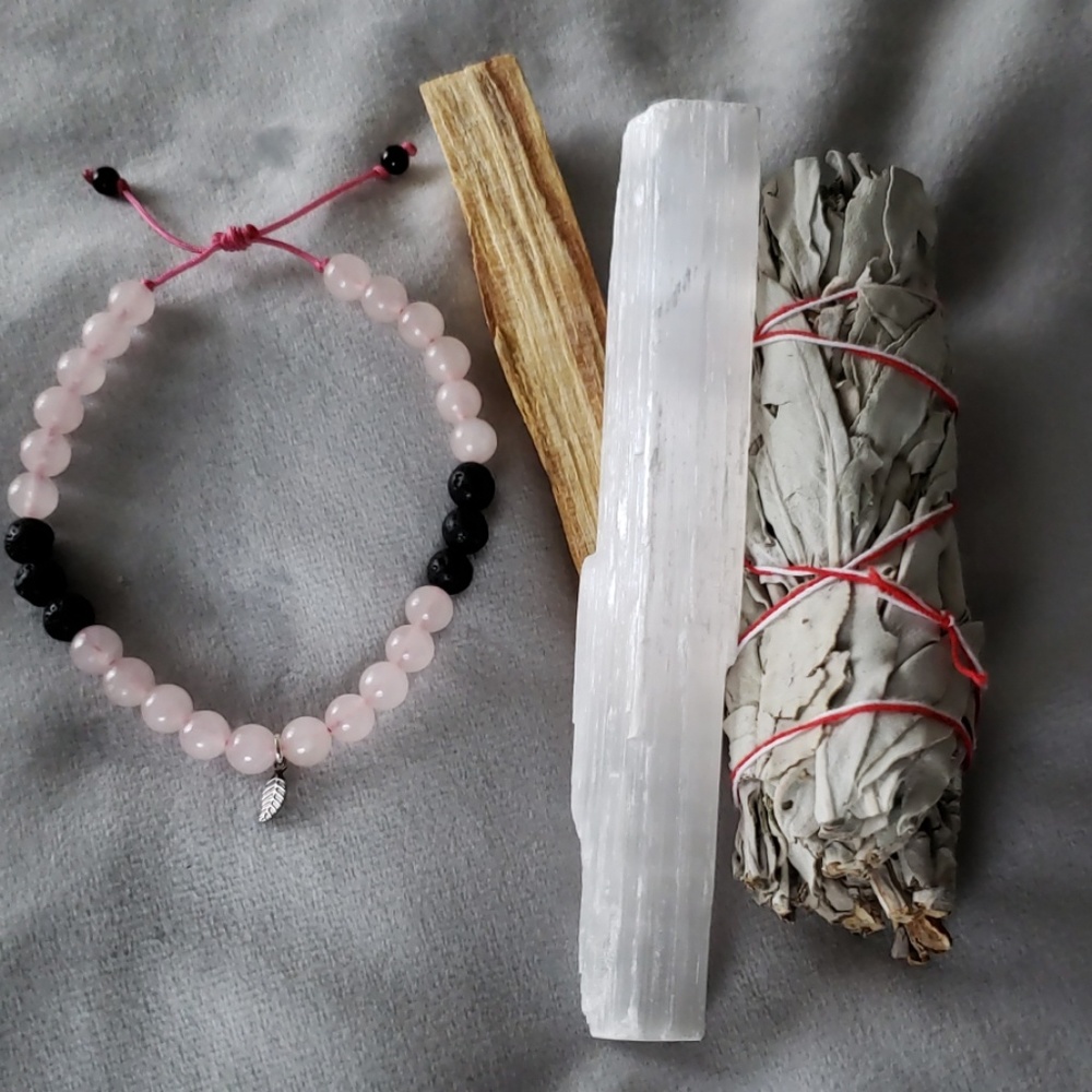 Beaded bracelet with healing bundle